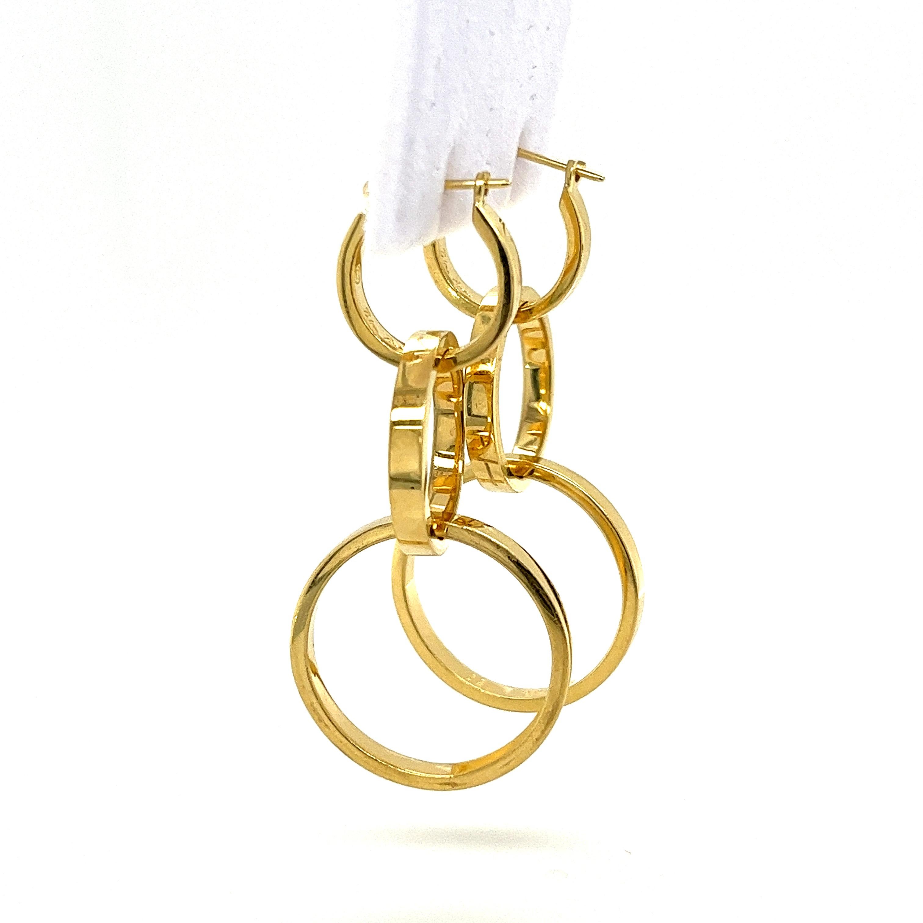 gold interlocking hoop earrings