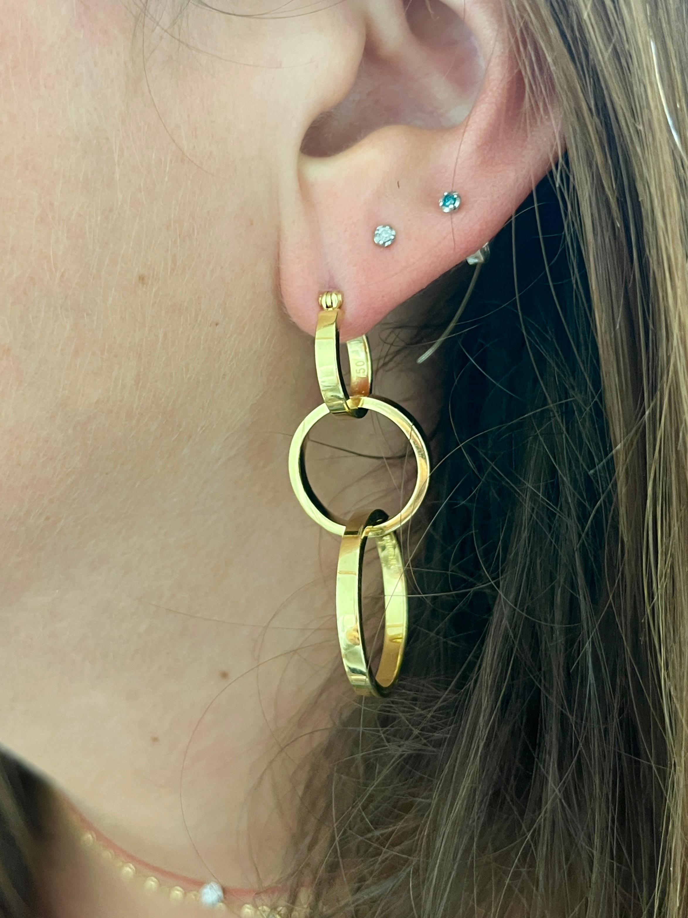 Paloma Picasso: 18 Karat Gold Ohrringe mit 3 Ringen und ineinandergreifenden Creolen Damen