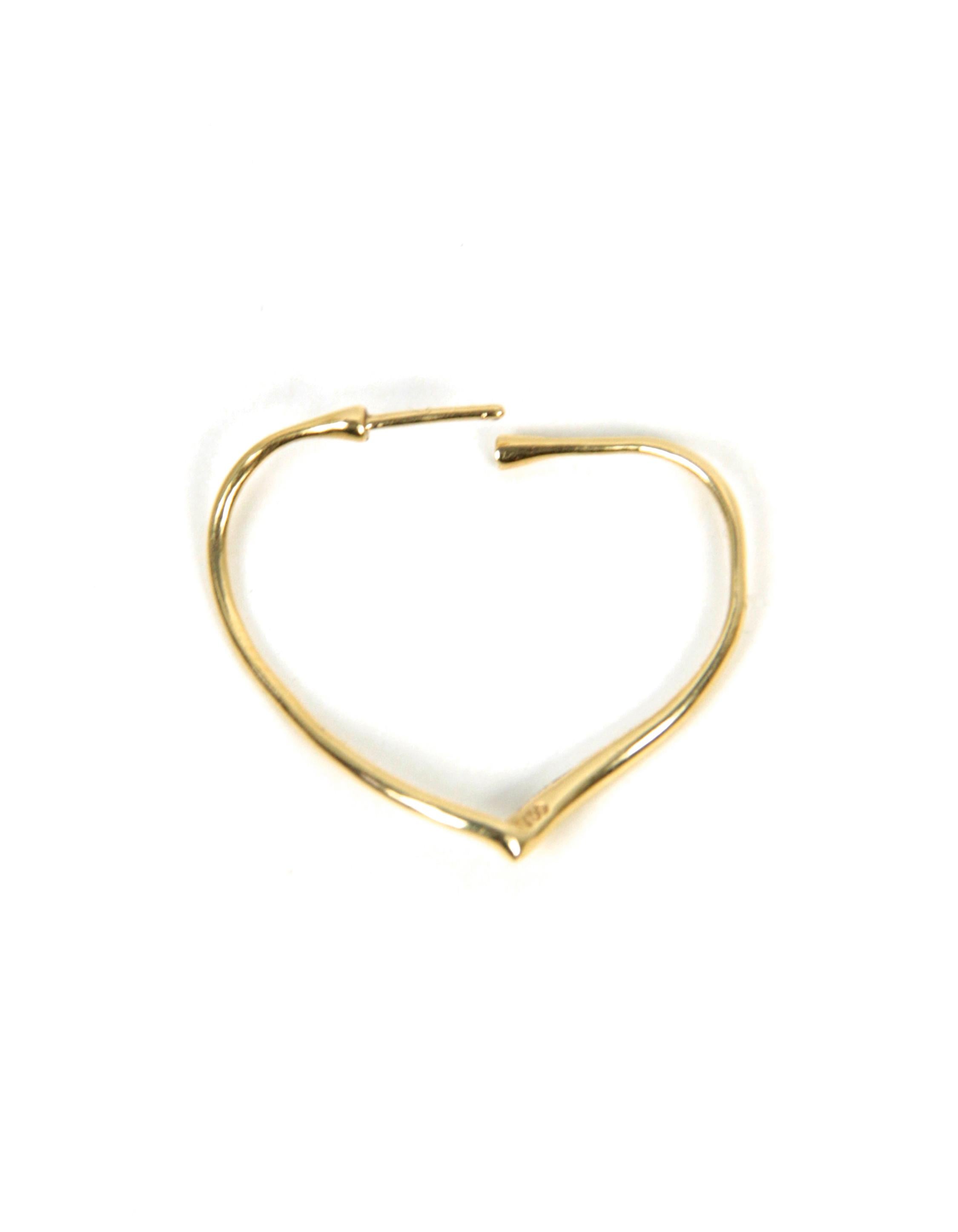 Tiffany & Co 18K Yellow Gold Elsa Peretti Open Heart Hoop Earrings

Materials: 18k yellow gold
Closure/Opening: Pierced back
Overall Condition: Excellent 
Current Retail: $2,500 plus tax
Includes: Tiffany & Co. Pouch

Measurements: Small Size-