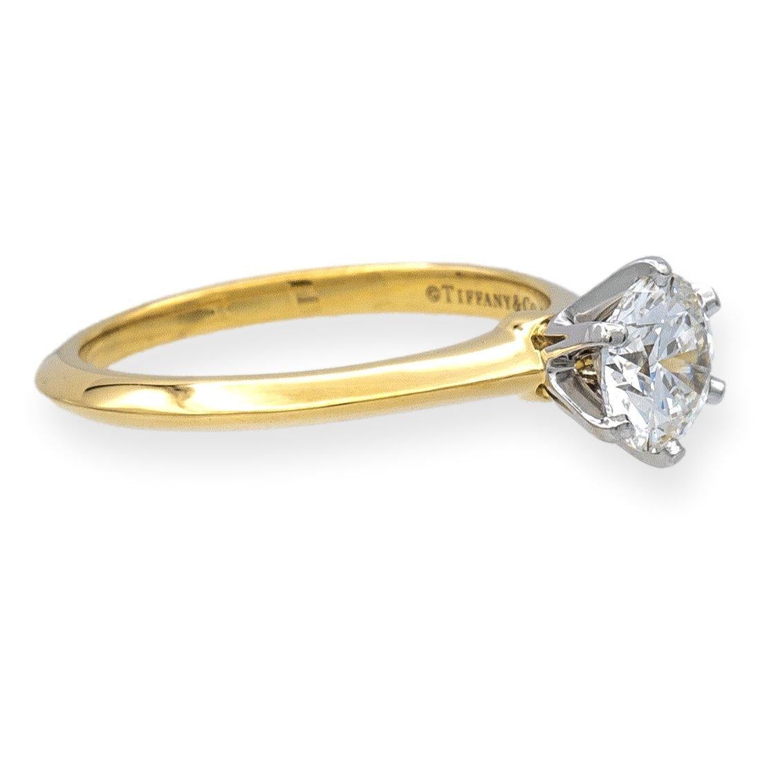 Modern Tiffany & Co. 18k Gold Platinum Round Diamond Engagement Ring .91Ct IVS1