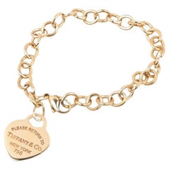 TIFFANY & Co. 18K Gold Return to Tiffany Heart Tag Charm Bracelet 7.25"