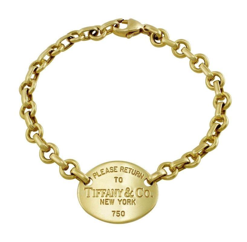 TIFFANY & CO. Oro 18K Torna al bracciale con medaglietta ovale Tiffany 

Metallo: Oro giallo 18 carati
Lunghezza: 7,5  
Peso: 20,10 grammi 
Hallmark: 