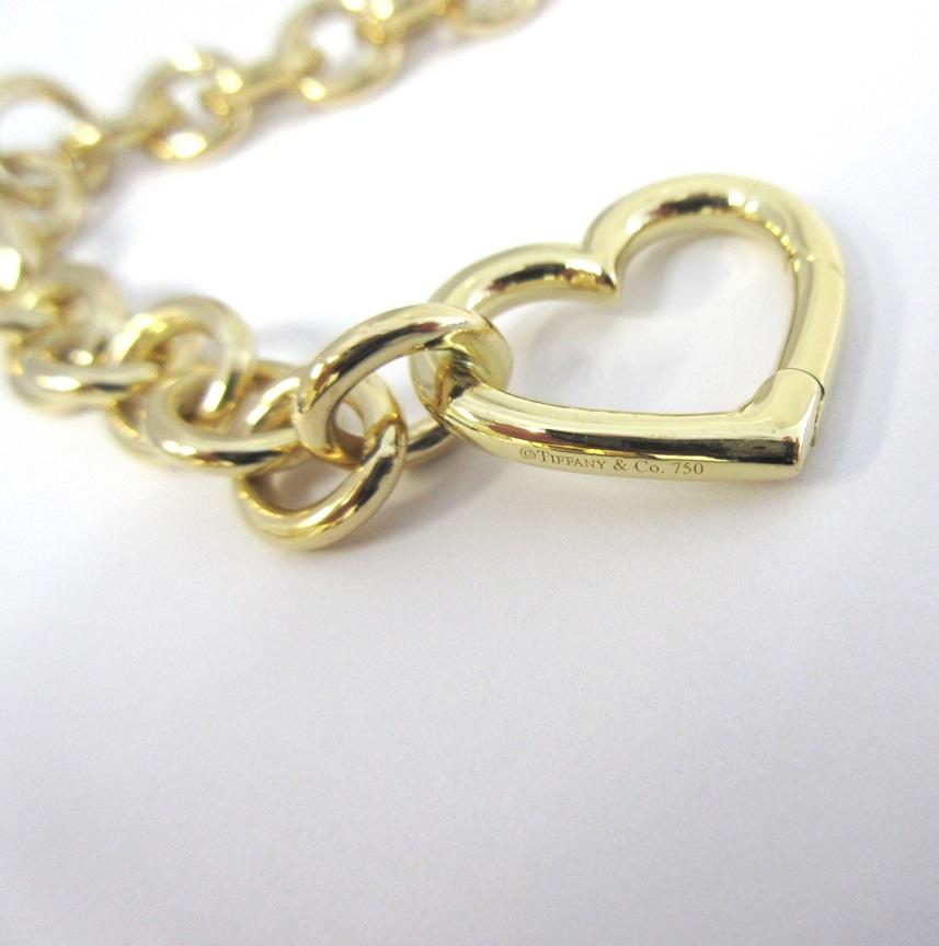 TIFFANY & Co. 18K Gold Rundes Gliederarmband mit Herzverschluss 7,5