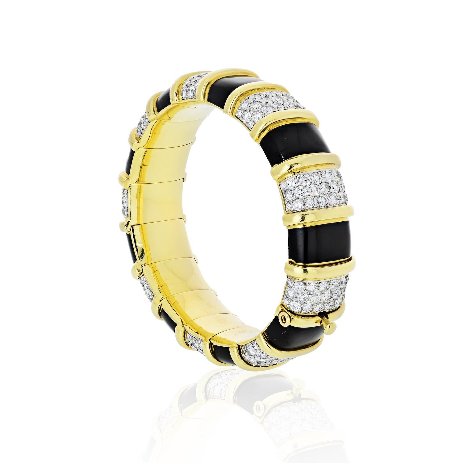 The Jean Schlumberger diamond bracelet features a juxtaposition of round brilliant white diamonds and black enamel framed in 18k gold and platinum. 

Jean Schlumberger, perhaps best known for his collaboration with famed jeweler Tiffany & Company,