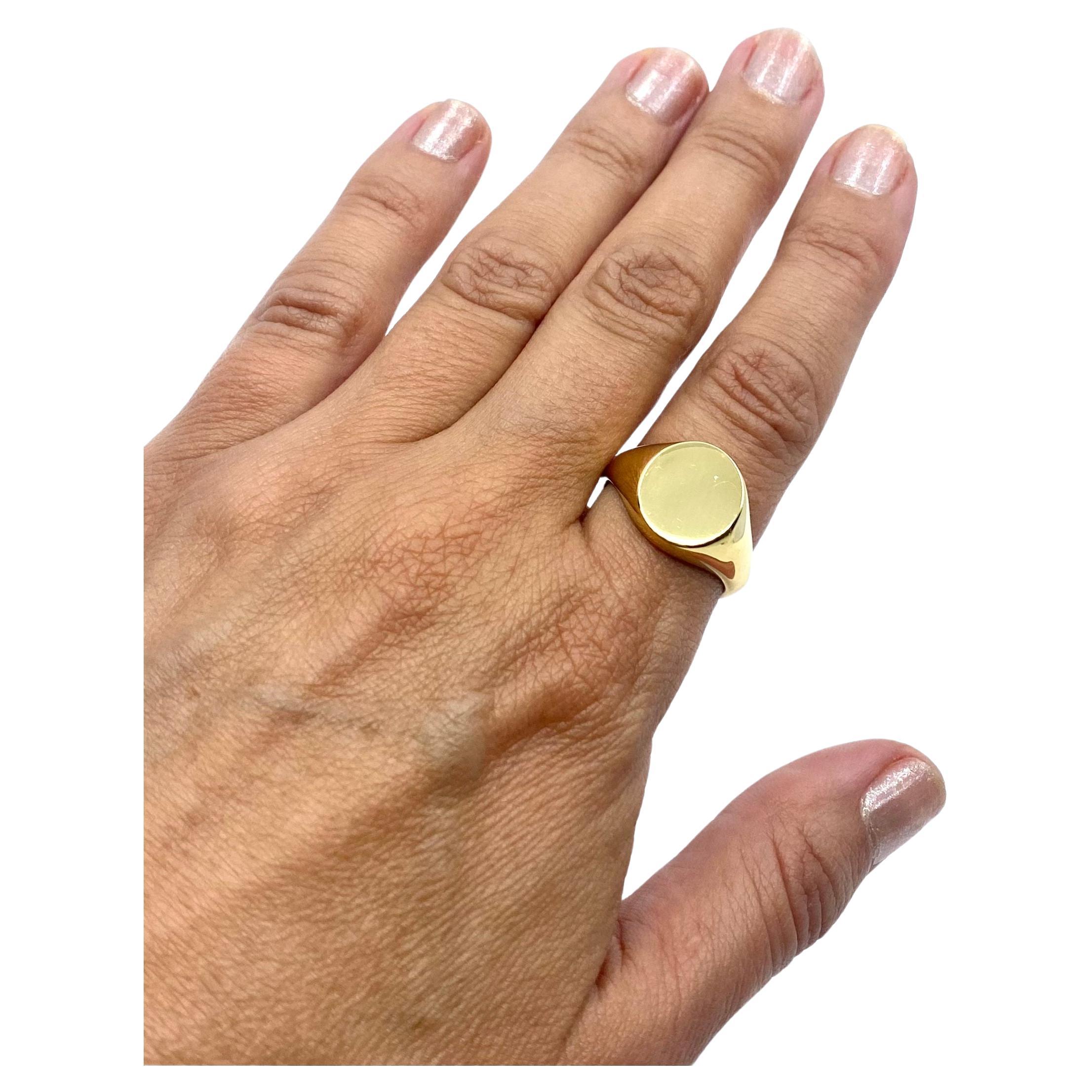 DESIGNER: Tiffany & Co.
CIRCA: 1970’s
MATERIALS: 18K Yellow Gold
WEIGHT: 14.3 grams
MEASUREMENTS:  1/2”
RING SIZE: 9.75 - 10
HALLMARKS: Tiffany & Co., 750

ITEM DETAILS:
​Less is more for this Tiffany & Co. Gold Signet Ring, made of 18k yellow