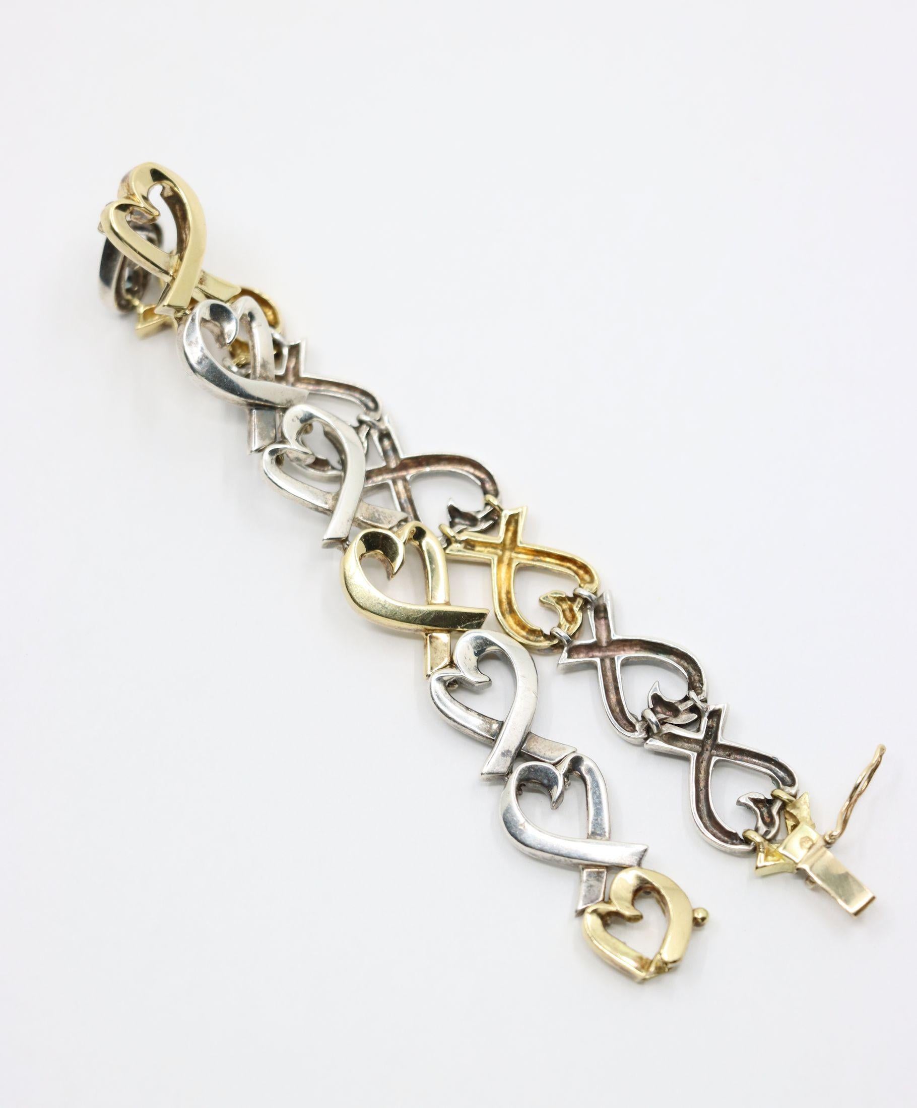 Tiffany & Co. Bracciale a cuore in oro 18 carati e sterlina in vendita 9