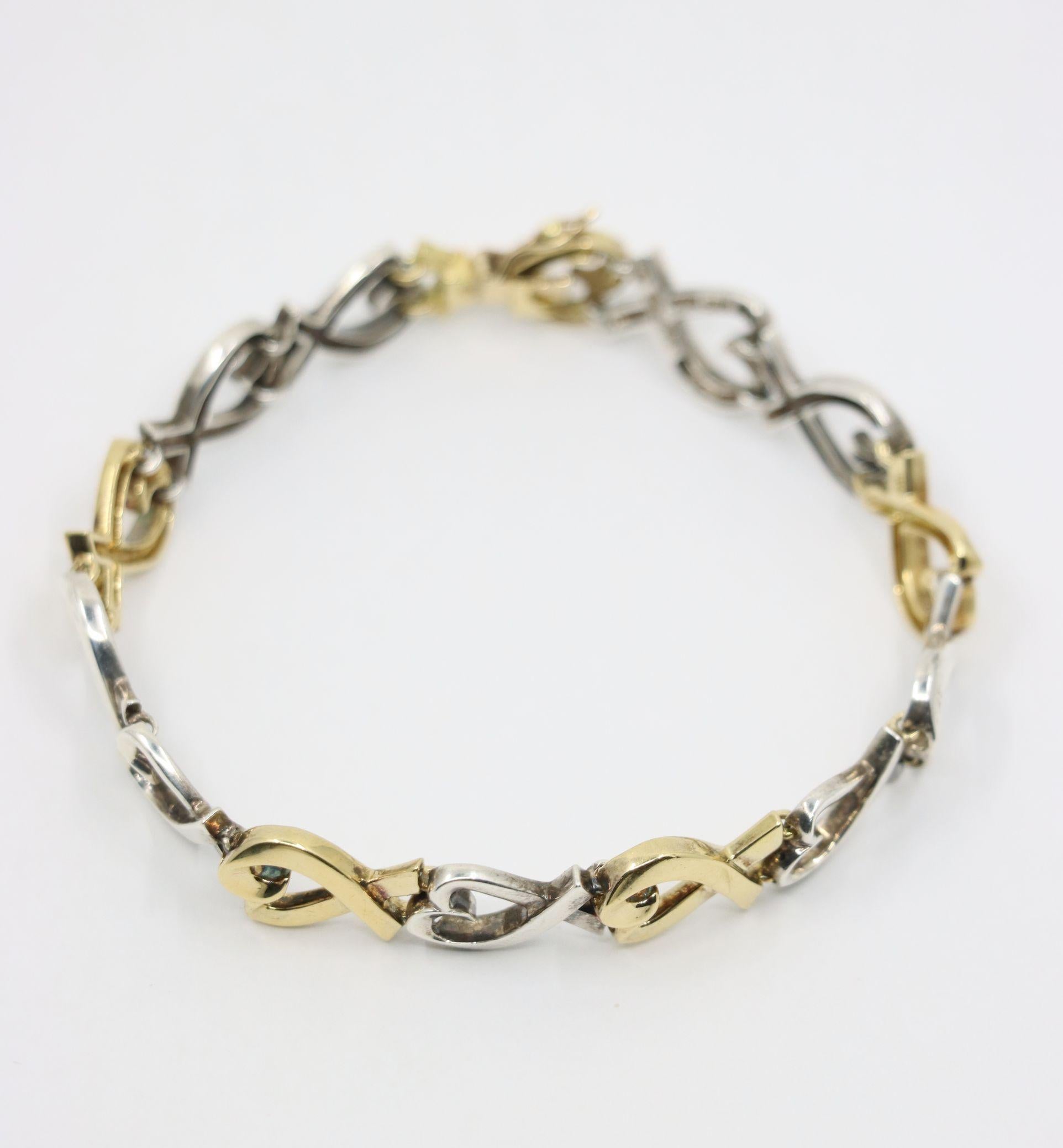 Tiffany & Co. Bracciale a cuore in oro 18 carati e sterlina In condizioni buone in vendita a Flushing, NY