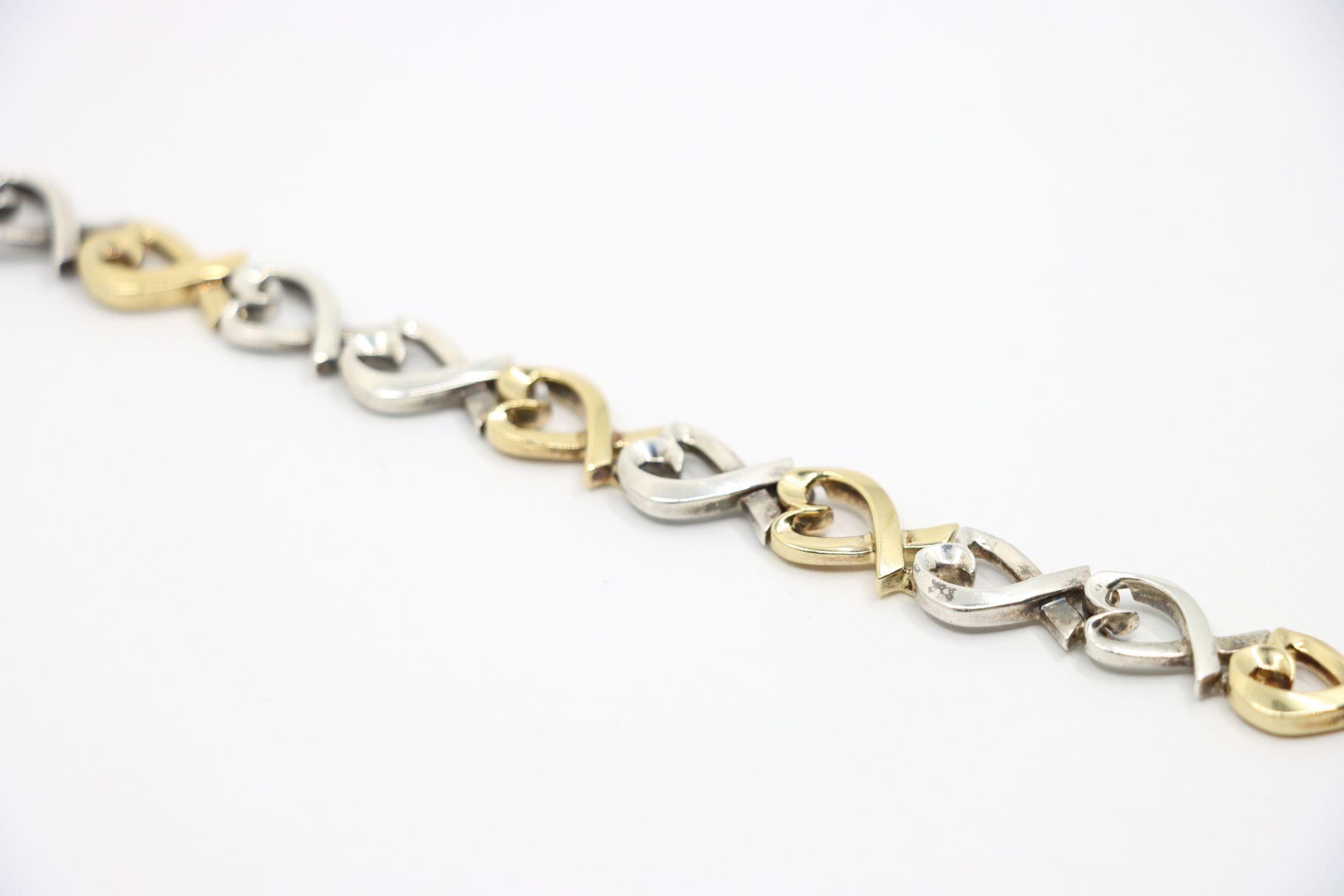 Tiffany & Co. Bracciale a cuore in oro 18 carati e sterlina in vendita 4