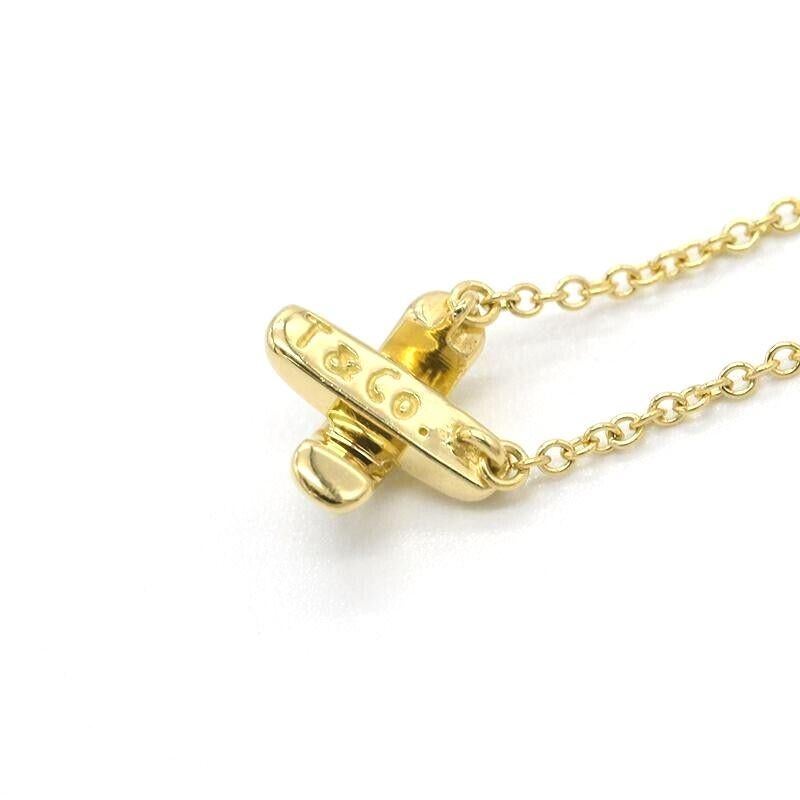 TIFFANY & Co. 18K Gold Stitch Cross Anhänger Halskette im Zustand „Hervorragend“ im Angebot in Los Angeles, CA