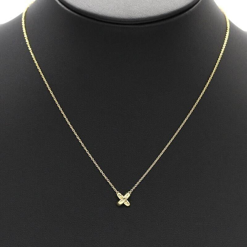 TIFFANY & Co. 18K Gold Stitch Cross Anhänger Halskette Damen im Angebot