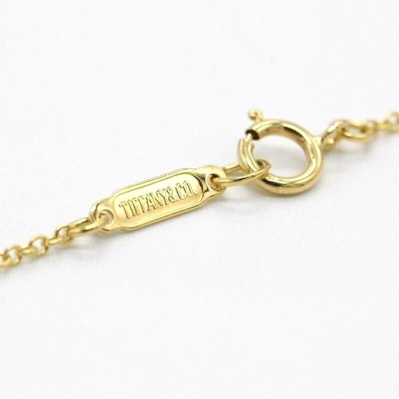 TIFFANY & Co. 18K Gold Stitch Cross Anhänger Halskette im Angebot 2