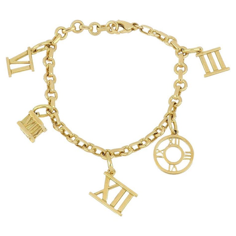 Tiffany and Co. 18K Gold Tiffany Atlas Charm Bracelet at 1stDibs | gold charm  bracelet tiffany, gold tiffany charm bracelet, tiffany gold charm bracelet