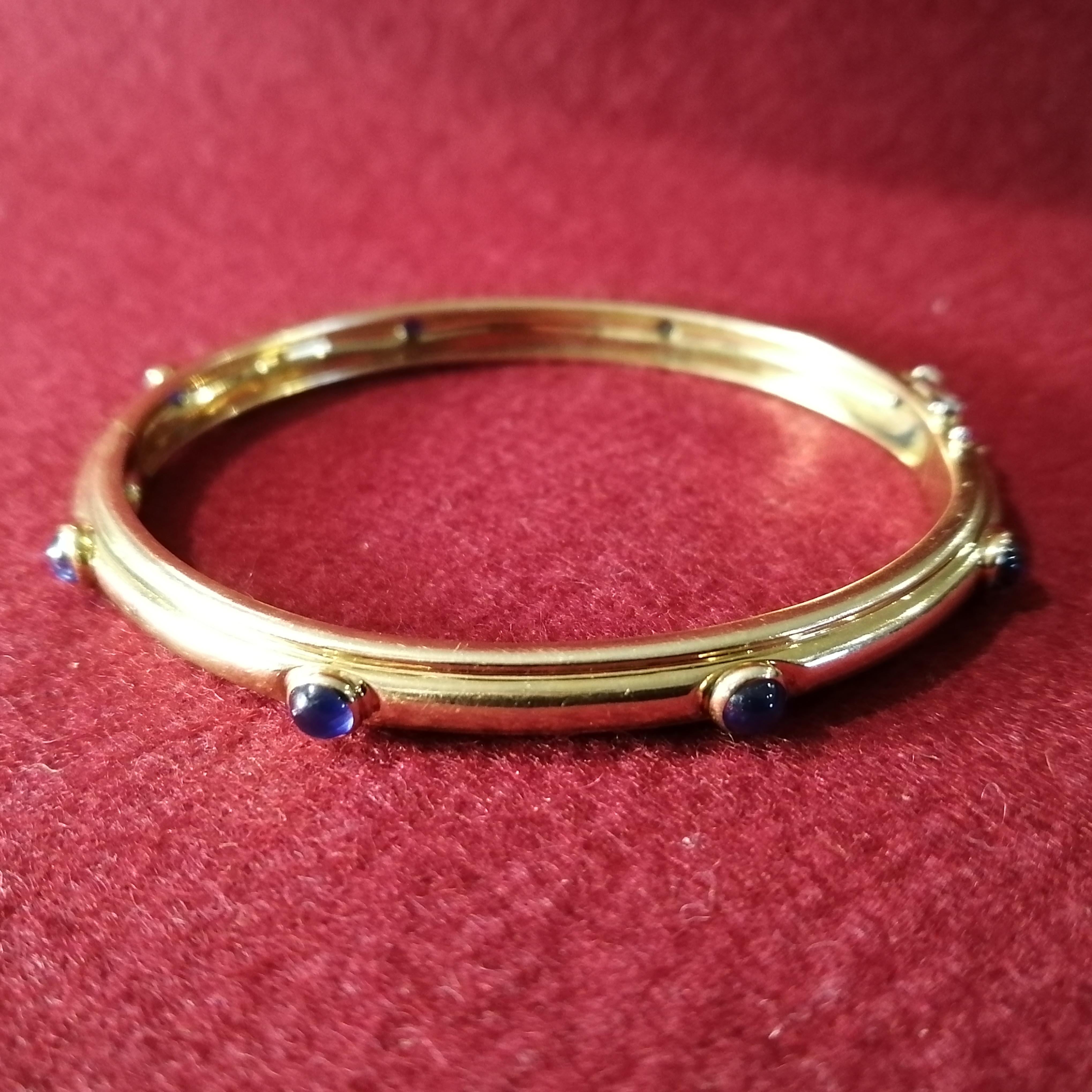 20th Century Tiffany & Co. 18-Karat Gold with Cabochon Sapphires Hinged Bangle Bracelet