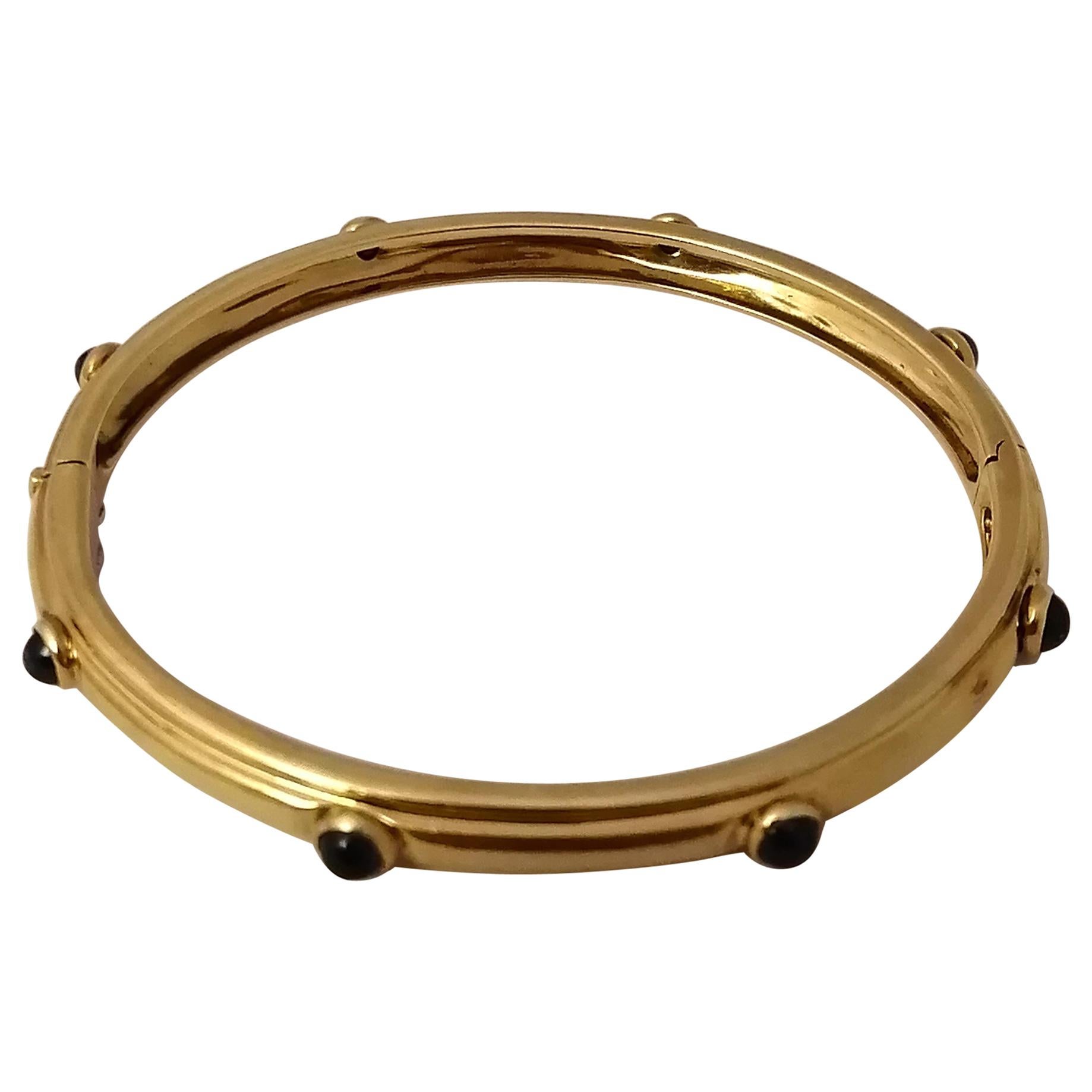 Tiffany & Co. 18-Karat Gold with Cabochon Sapphires Hinged Bangle Bracelet