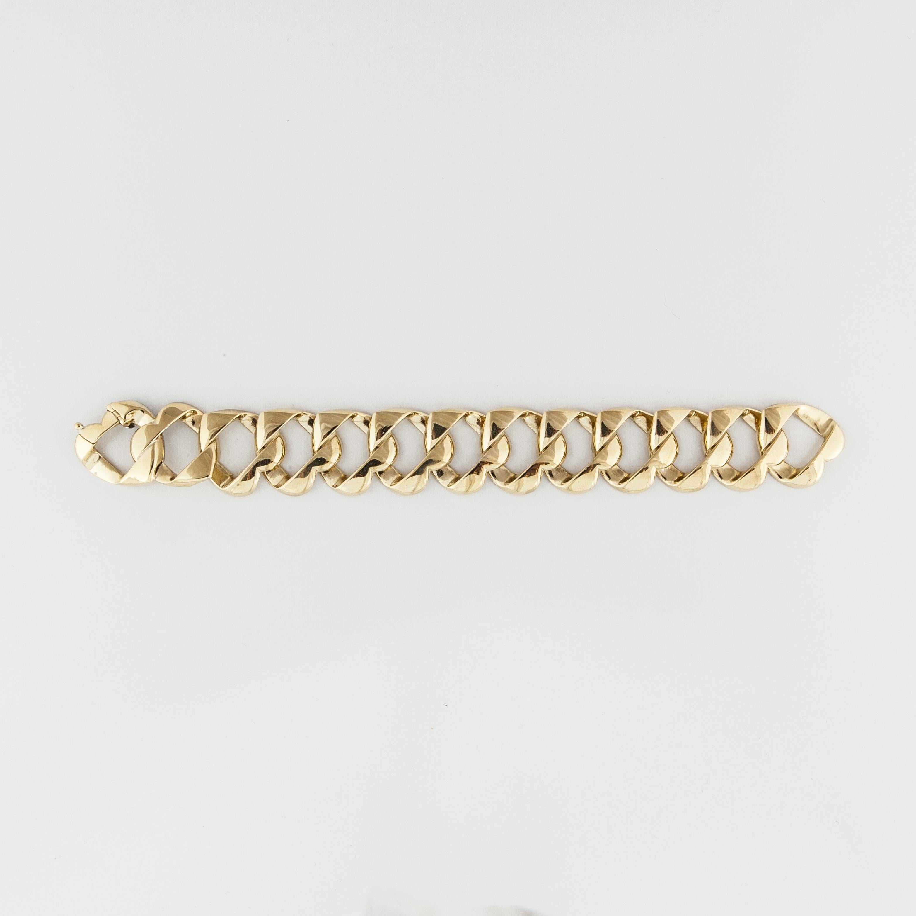 Tiffany & Co. 18K yellow gold bracelet.  The links are interlocking hearts.  Measures 8