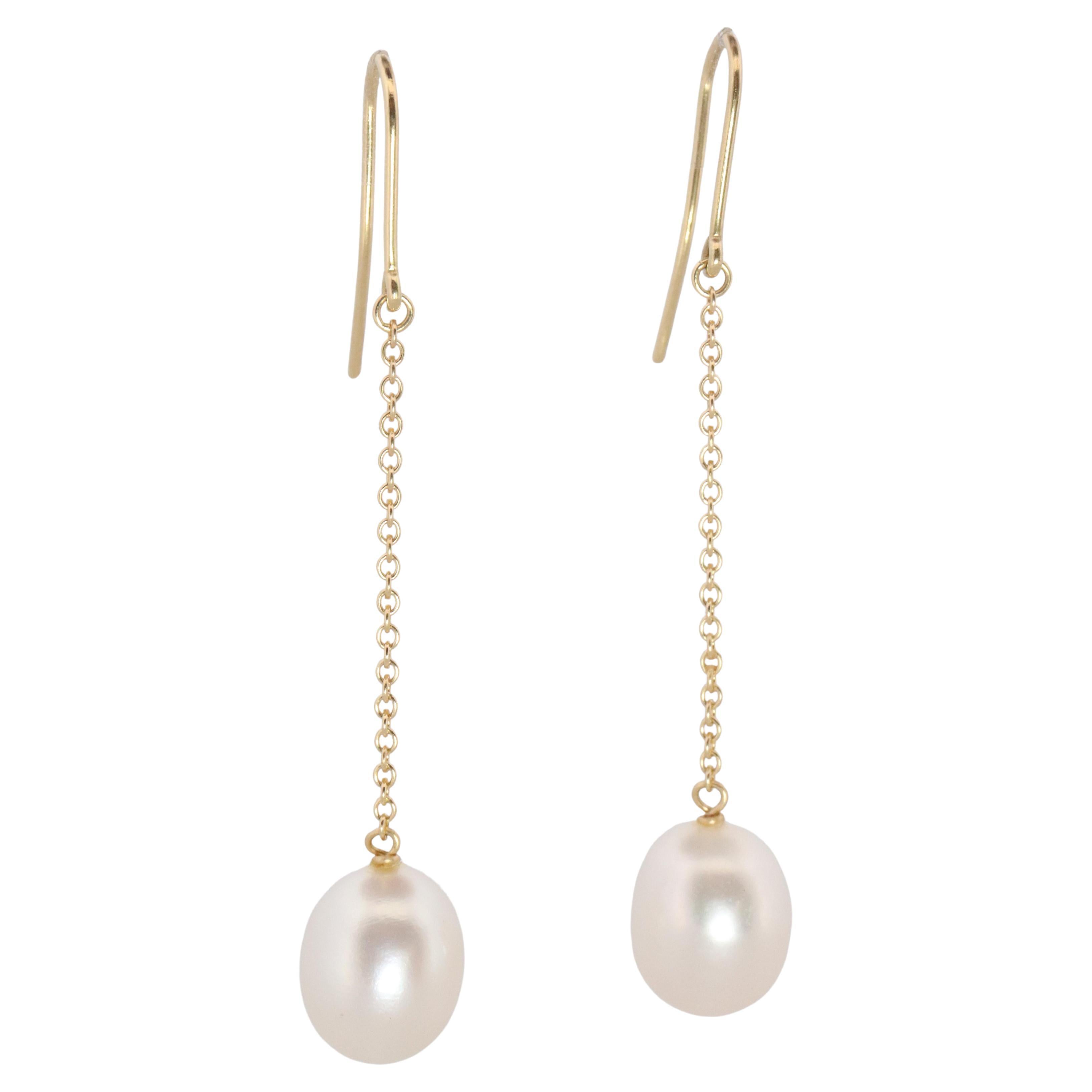 Tiffany
Co 18k Pearl by the Yard Earrings. Tiffany Elsa Peretti Drop Earrings.