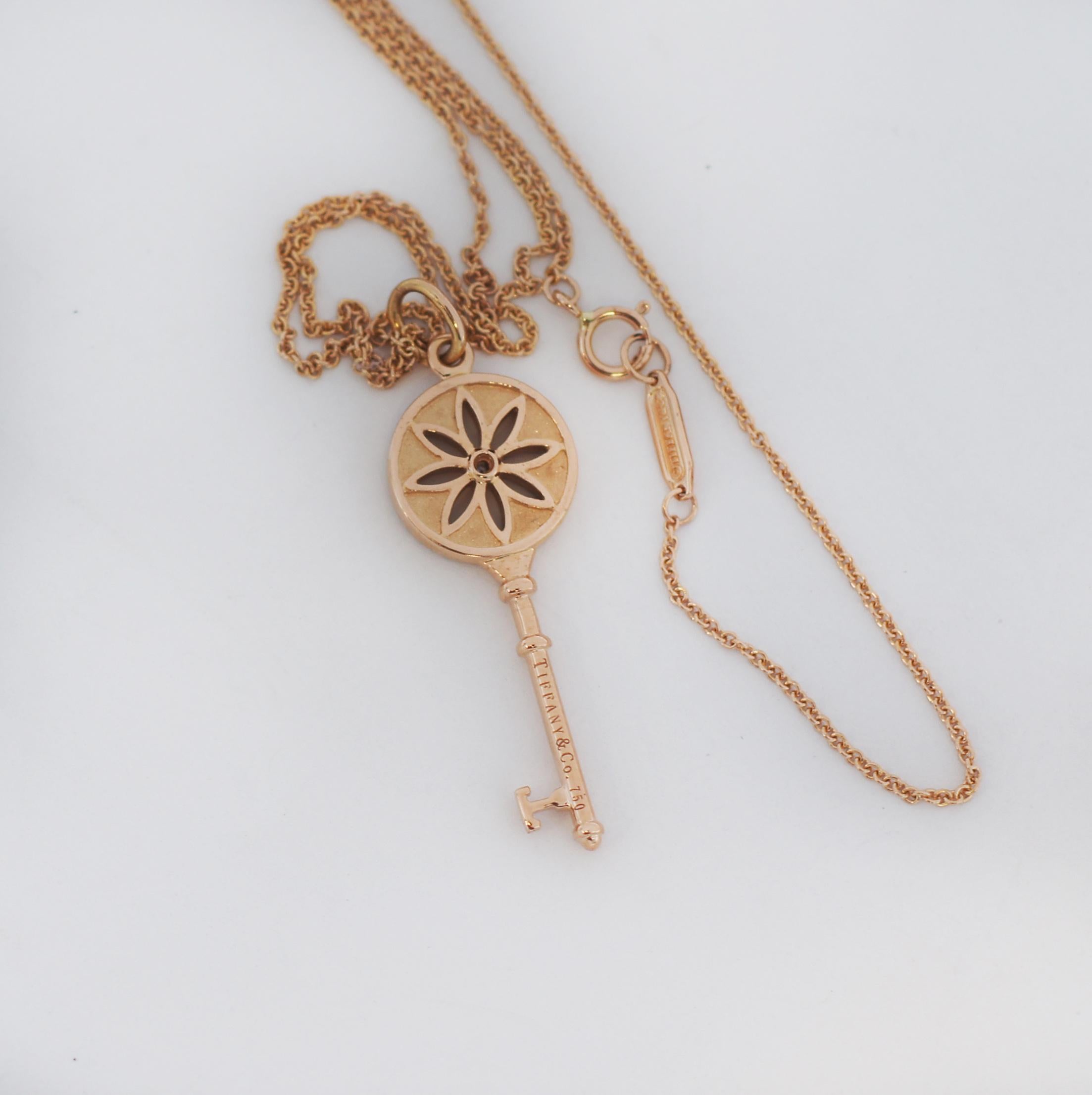 Tiffany & Co. 18K Rose Gold Diamond Daisy Key Necklace In Good Condition In San Fernando, CA