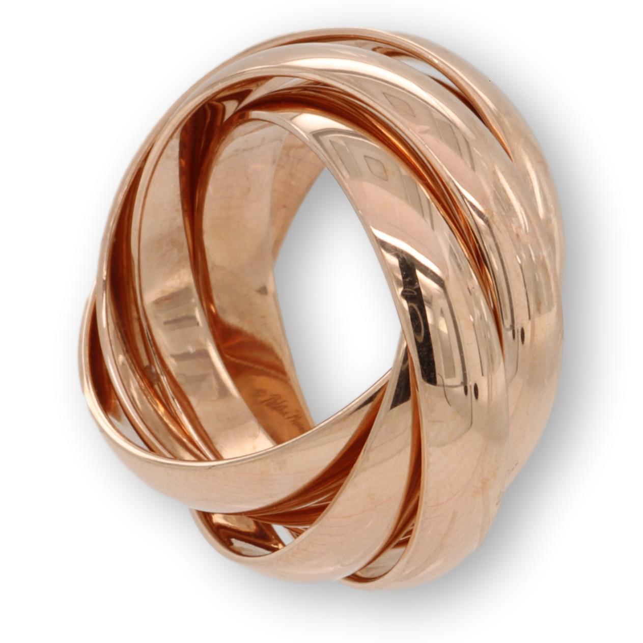Tiffany & Co. rolling ring from the Melody collection designed by Paloma Picasso finely crafted in 18 karat rose gold with 5 interlocking bands measuring 3.9 mm wide each. This is an original design copyrighted by Paloma Picasso. Fully hallmarked