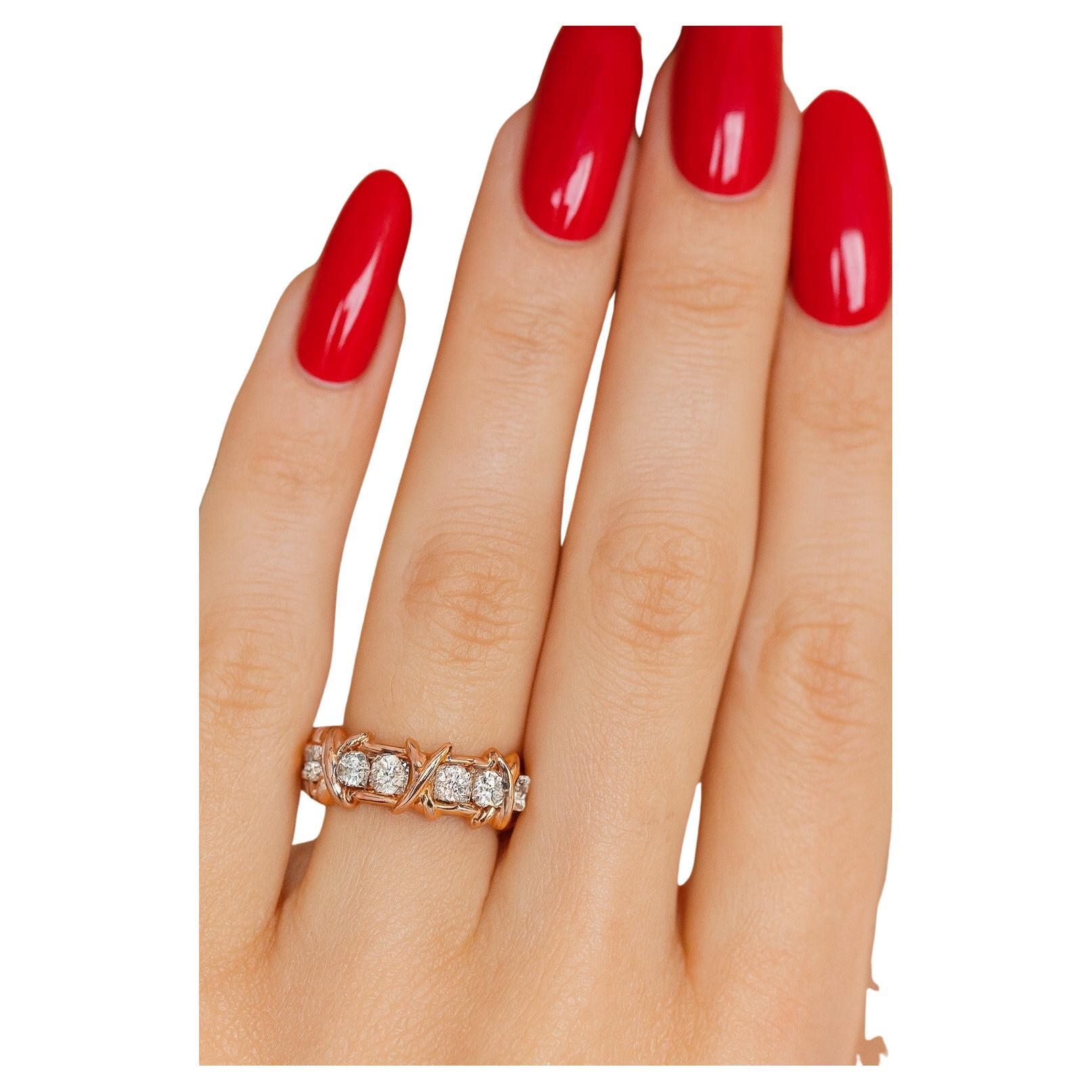 Tiffany & Co. 18K Rose Gold & Platinum Schlumberger Sixteen Diamond X Band Ring

From the iconic Jean Schlumberger Collection, this striking band is crafted in 18K rose gold and platinum. The design features Schlumberger’s signature “X” motif,