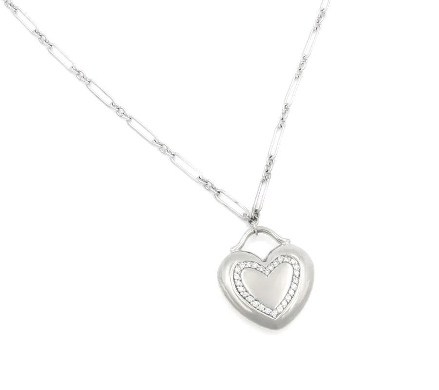 TIFFANY & Co. 18K White Gold .17ct Diamond Heart Pendant Necklace

Tiffany gets to the heart of the matter. Pendant with diamonds in 18k white gold. Size large, on an 18