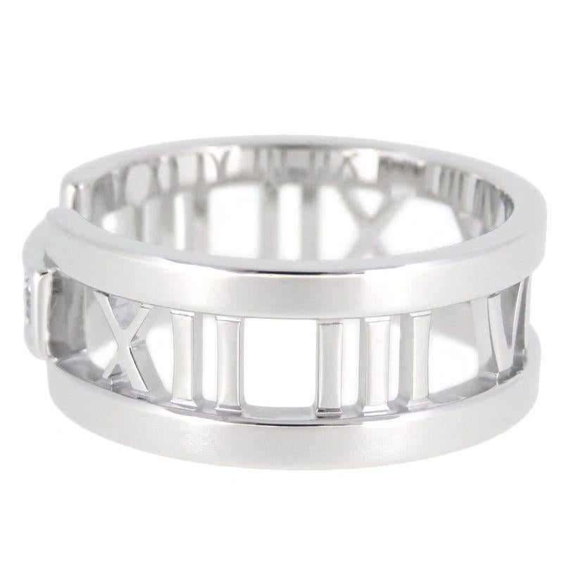 TIFFANY & Co. 18K White Gold 3 Diamond Atlas Open Ring 9

Metal: 18K White Gold
Size: 9
Band Width: 8.5mm
Weight: 8.70 grams
Diamond: 3 round brilliant diamonds, carat total weight .10
Hallmark: ATLAS ©2003 TIFFANY&Co. 750 ITALY
Condition: Excellent