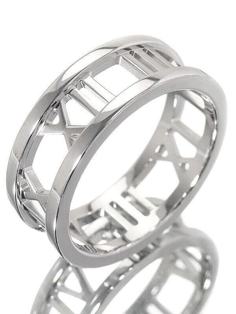 TIFFANY & Co. 18K White Gold Atlas Open Ring 6.5

Metal: 18K White Gold 
Size: 6.5 
Band Width: 7mm
Weight: 6.10 grams 
Hallmark: ATLAS © 2003 TIFFANY&CO. 750 
Condition: Excellent condition, like new

Limited edition, no longer available for sale