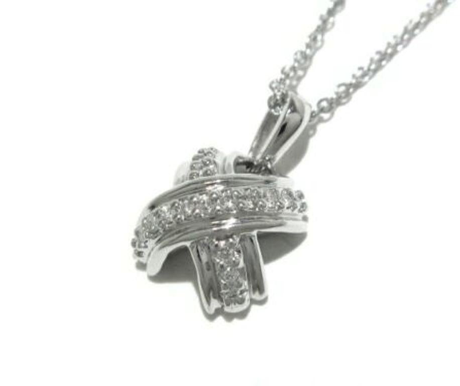 TIFFANY & Co. 18K Weißgold Diamant 10mm Signature X Anhänger Halskette

Metall: 18K Weißgold 
Gewicht: 3,10 Gramm  
Kette: 16