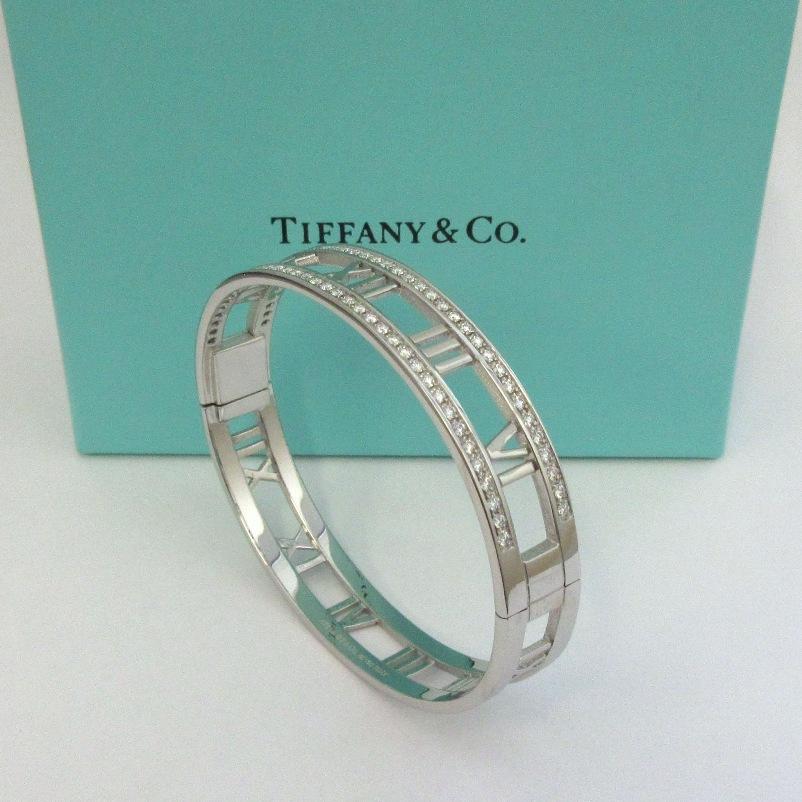 TIFFANY & Co. 18K White Gold Diamond Atlas Roman Numeral Hinged Bangle Bracelet

Metal: 18K White Gold
Weight: 30.0 grams
Size: Medium, fits wrists up to 6.5
