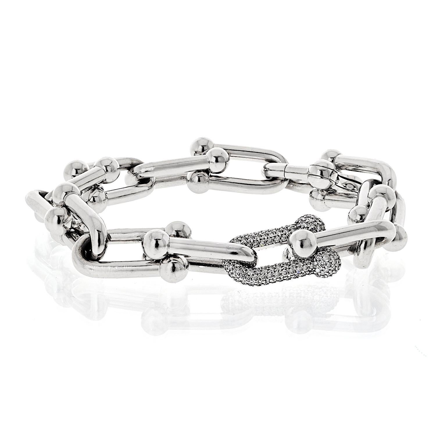 Tiffany & Co. HardWear Collection Bracelet  

This pre-owned Tiffany & Co. bracelet from the iconic HardWear collection is a stunning example of modern elegance. Crafted in 18K white gold, it features a single link encrusted with brilliant round