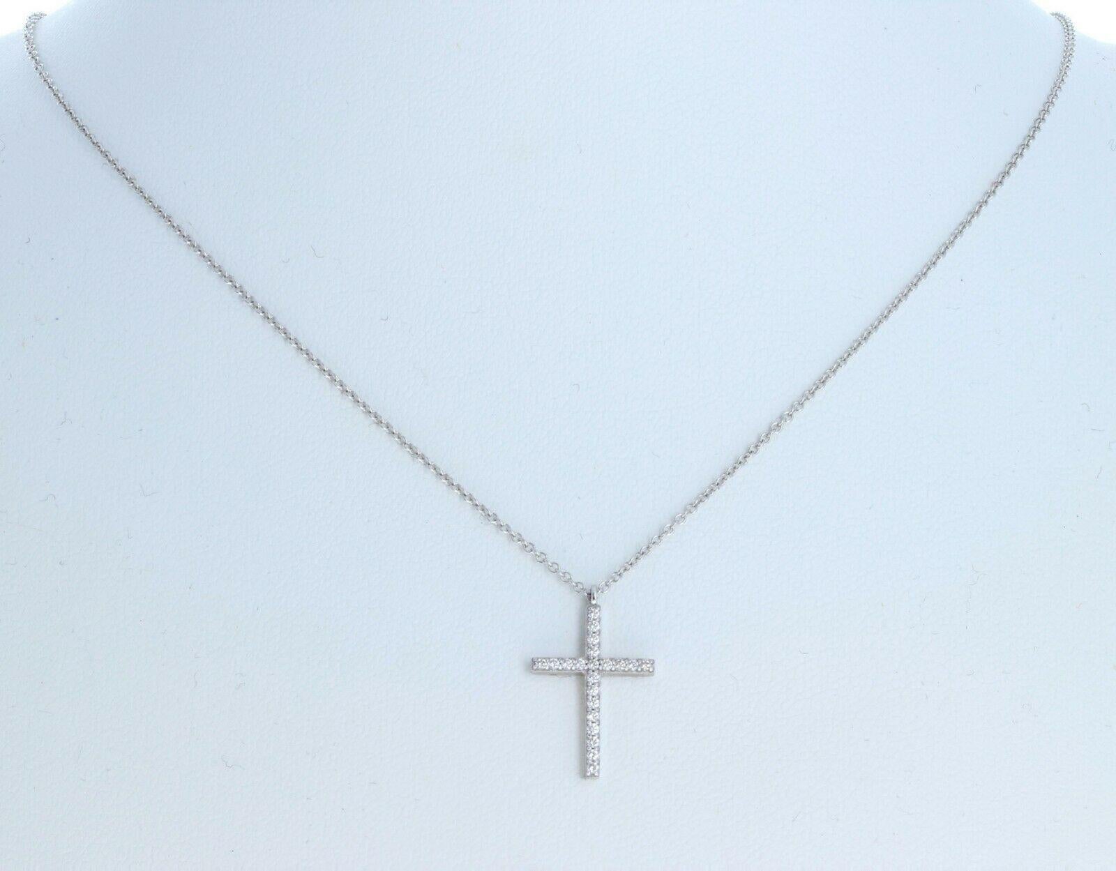 Tiffany & Co 18K White Gold & Diamond Small Cross Pendant Necklace 

 

Beautiful Tiffany & Co diamond cross pendant necklace 

Very elegant for everyday wear !!

G, VS1 diamonds

Chain Length: 16' inches

Pendant: 1.2 X 1.9 cm

Weight 2.6 grams


