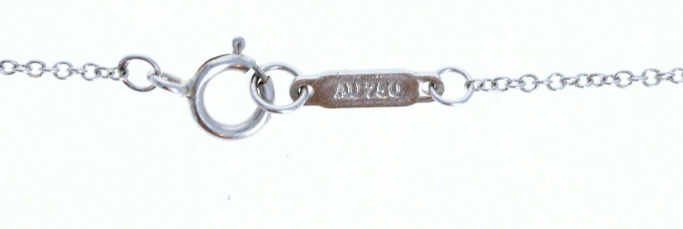 Tiffany & Co. 18k White Gold & Diamond Small Cross Pendant Necklace In Good Condition In Beverly Hills, CA