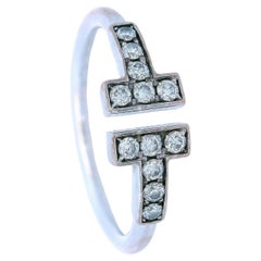 Tiffany
Co. 18k White Gold Diamond T Wire Ring