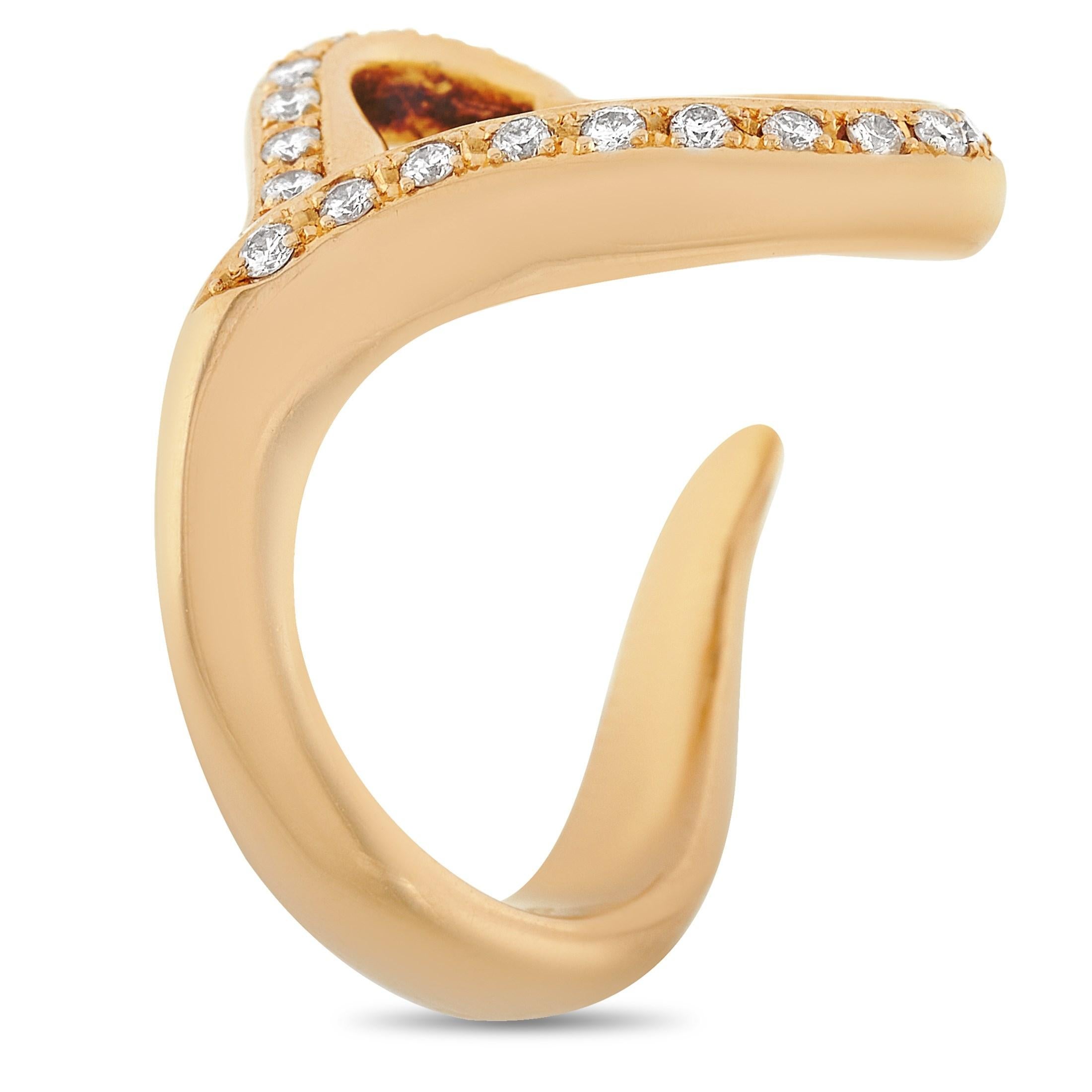 This Tiffany & Co. ring is unique and symbolizes affection from whoever is giving it. The ring is crafted from 18K yellow gold and set with 0.20 carats OF diamondS around the heart shape. It weighs 8.1 grams with a band thickness of 3mm, a top