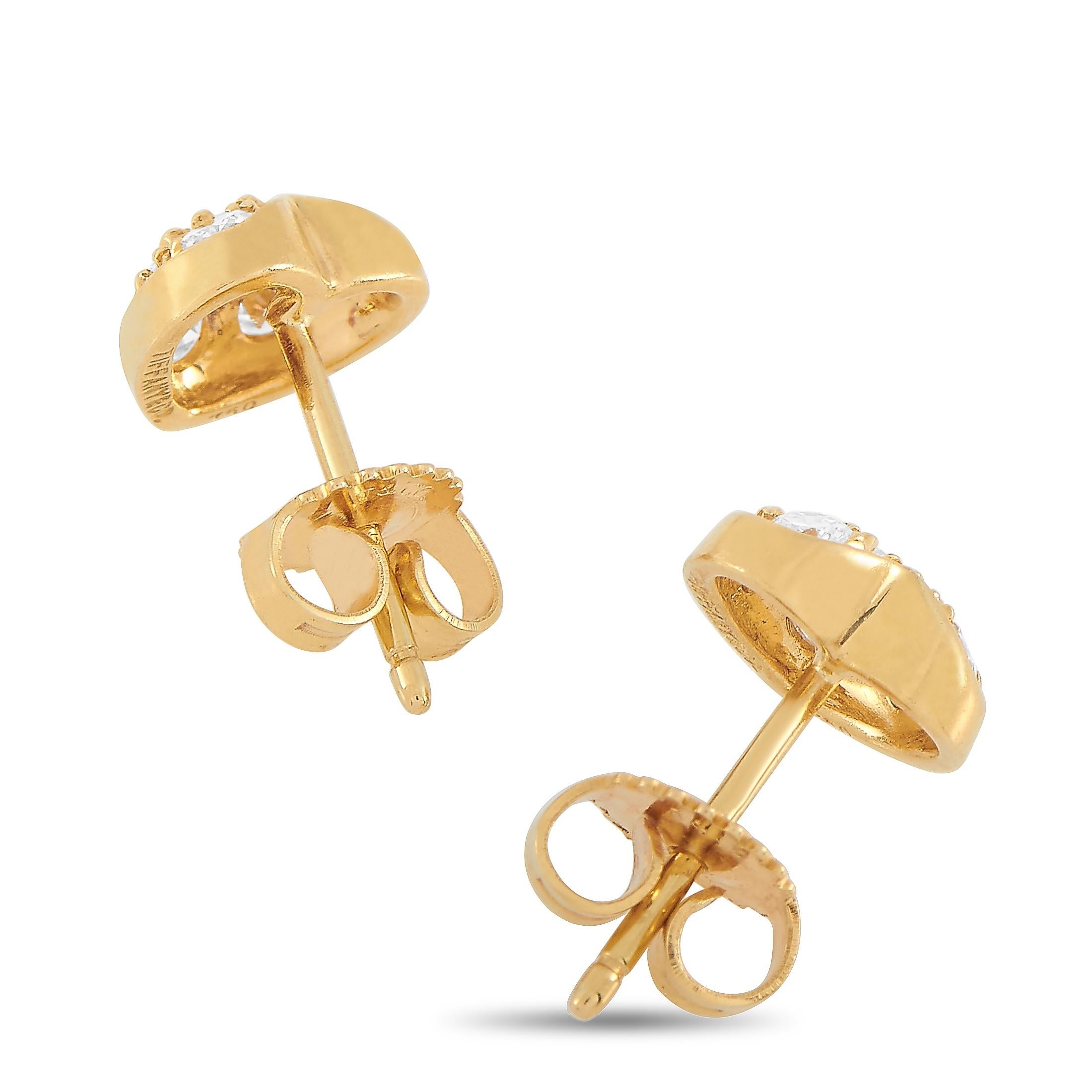 These Tiffany & Co. heart earrings are made of 18K yellow gold and embellished with diamonds that amount to 0.35 carats. The earrings measure 0.37” in length and 0.37” in width and each of the two weighs 1.2 grams.
 
 The pair is offered in estate