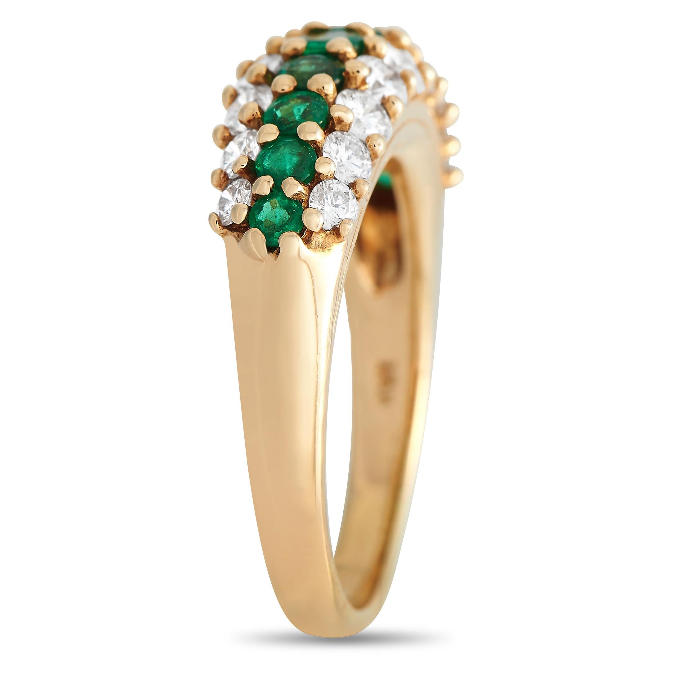 Everyone's eyes will be green with envy once they catch a glimpse of this glamorous piece from Tiffany & Co. This 18K yellow gold ring shimmers with three rows of precious gemstones. Sandwiched in between two borders of tapering diamonds is a row of