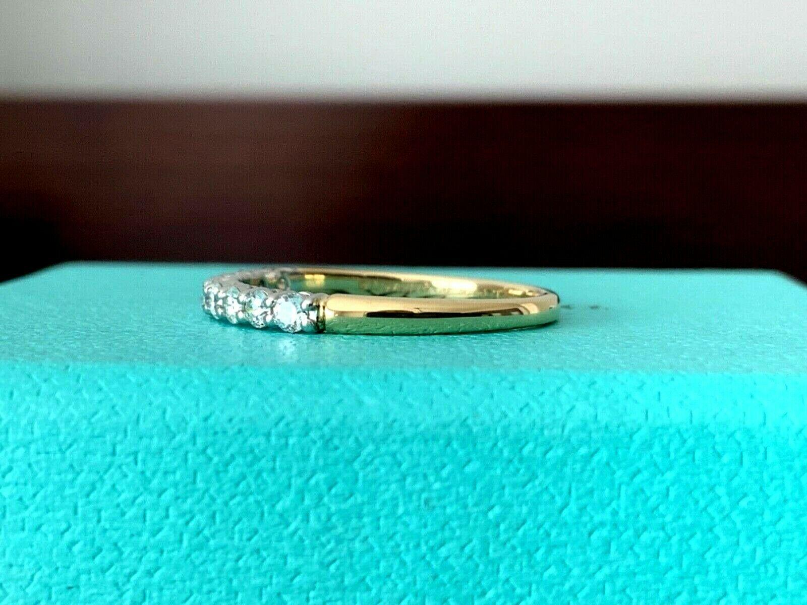 Round Cut Tiffany & Co. 18 Karat Yellow Gold Embrace Diamond Eternity Ring .23 Carat G VS1