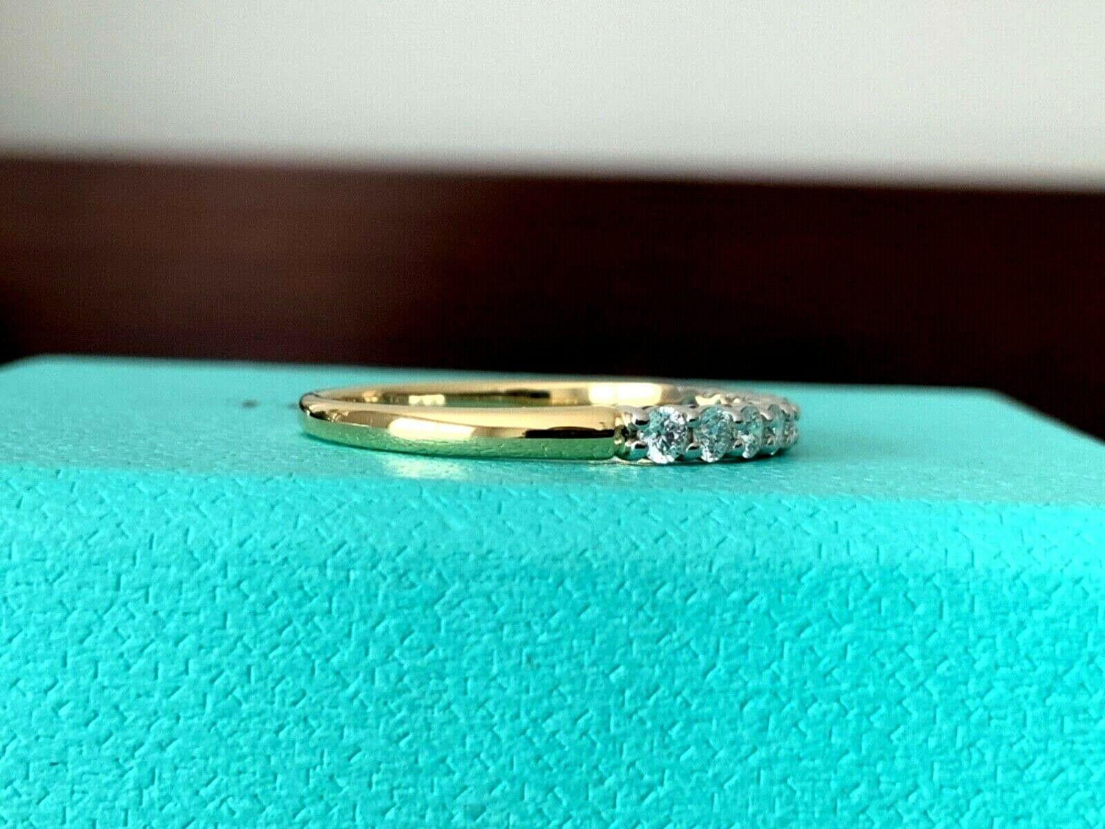 Tiffany & Co. 18 Karat Yellow Gold Embrace Diamond Eternity Ring .23 Carat G VS1 In Excellent Condition In Middletown, DE
