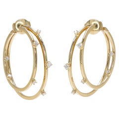 Tiffany
Co 18k Yellow Gold and Diamond Hoop Earrings 0.38 Carats Tiffany
Co 18k Yellow Gold and Diamond Hoop Earrings 0.38 Carats