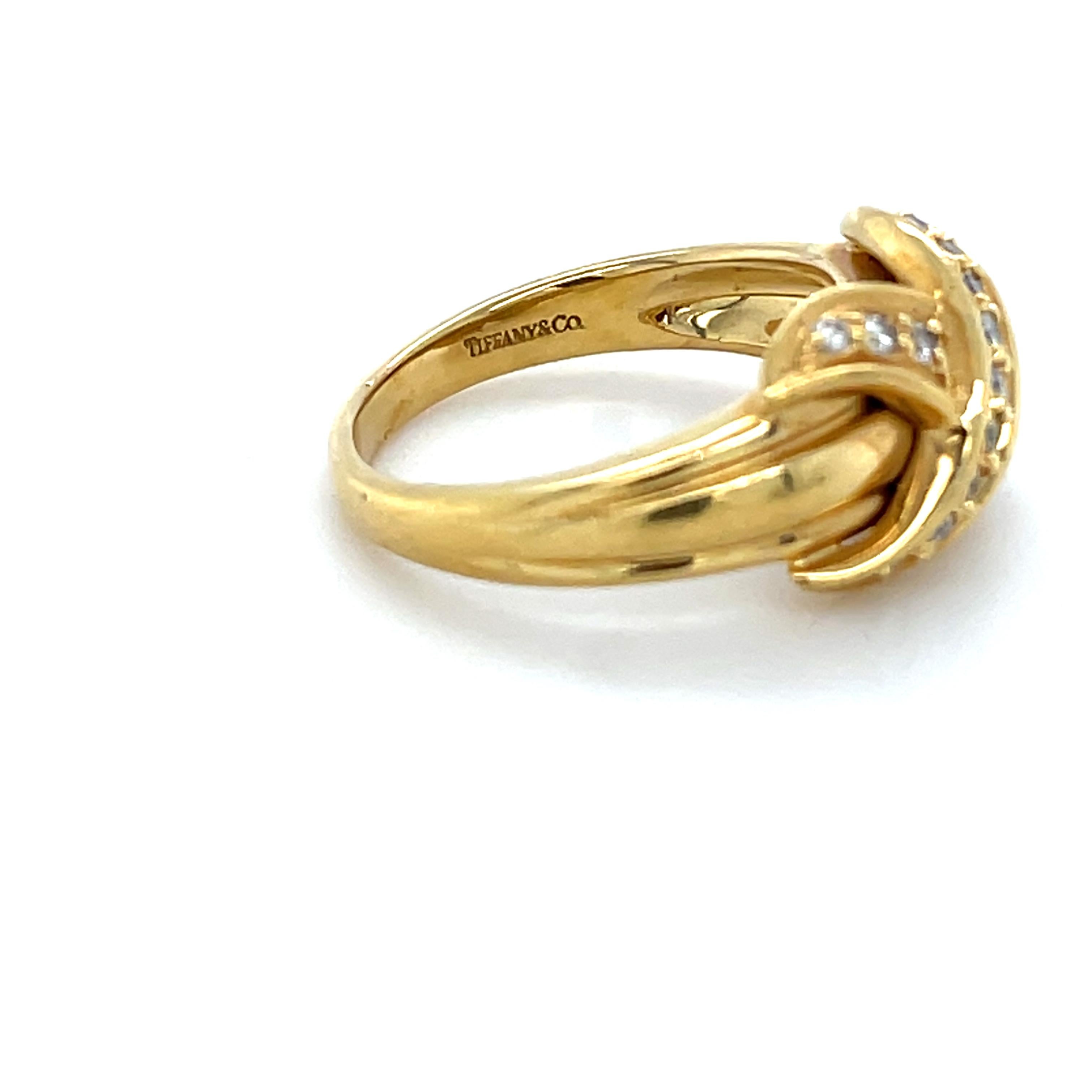 This classic ring designed by Tiffany & Co. from their Signature X Collection, contains 15 round brilliant cut diamonds weighing approximately 0.20 carat total.

Ring Size: 5 1/4
Stamp: TIFFANY&CO. 750.
Metal: 18 karat yellow gold
Gross weight: 6.10
