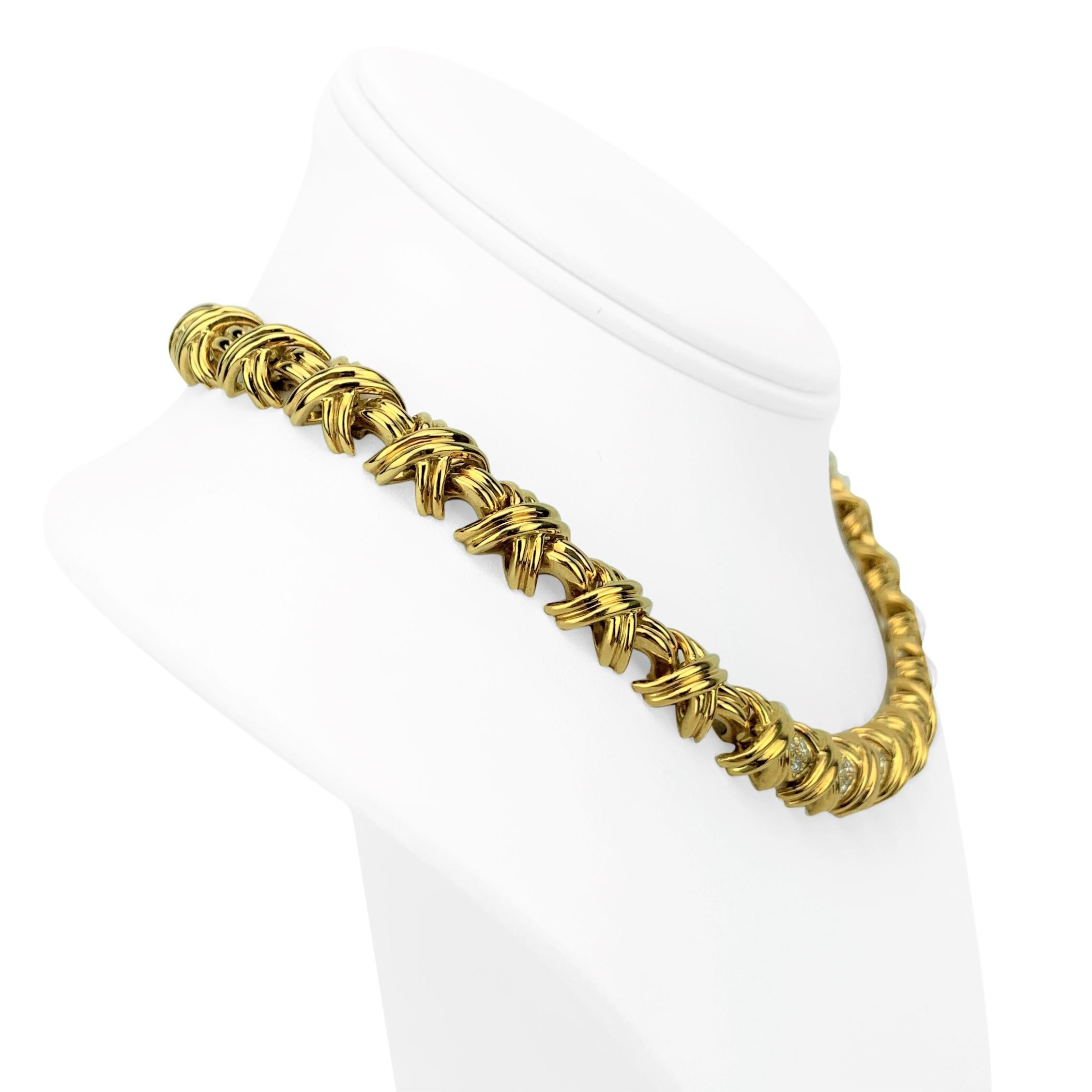 Tiffany & Co. 18k Yellow Gold and Diamond X Link Collar Necklace

Condition:  Excellent (Professionally Cleaned and Polished)
Metal:  18k Gold (Marked, and Professionally Tested)
Weight:  99.6g
Length:  16 Inches
Width:  11mm 
Diamonds:  32 Round