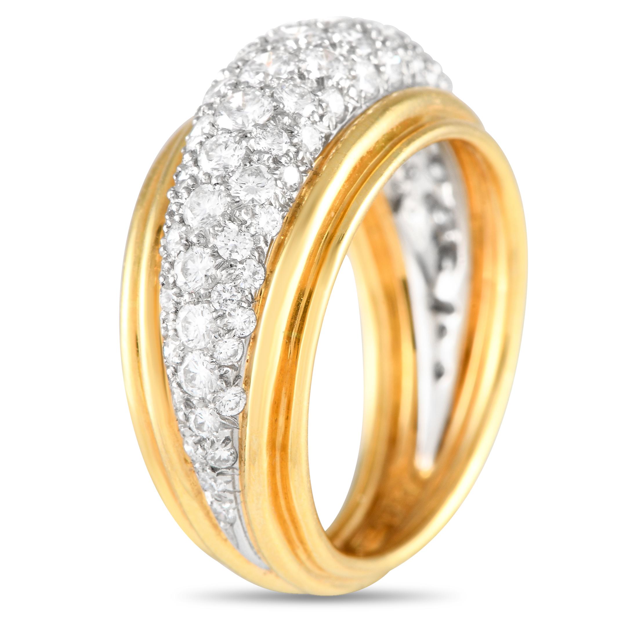 This Tiffany & Co. beautifully combines 18K yellow gold and platinum into the exquisite, minimalist setting. At the center of the design, pav diamonds with a total weight of 1.25 carats sparkle and shine along with every movement. This luxurious yet