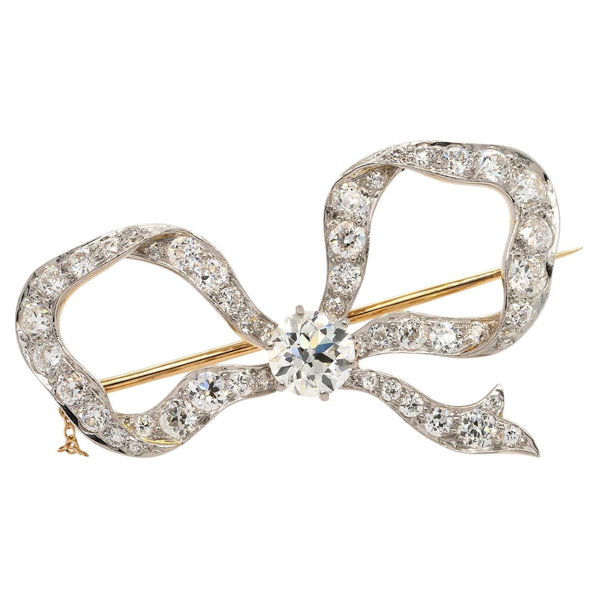 Broche con lazo de diamantes naturales Tiffany & Co. de oro amarillo de 18 quilates y platino de 8,00 quilates en venta
