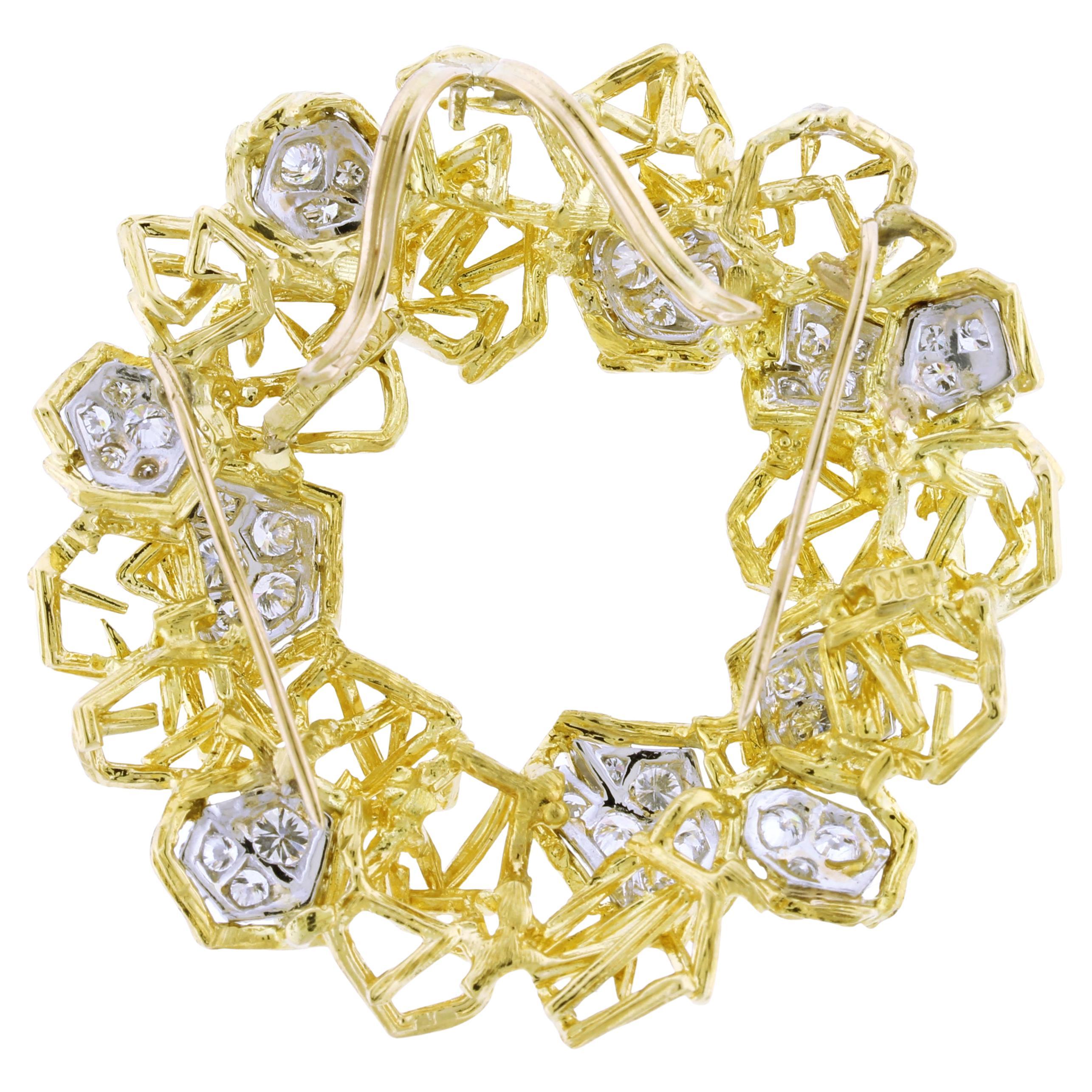 A stunning and versatile vintage piece from Tiffany & Co., crafted in rich 18K yellow gold with platinum accents. This intricate design features an openwork circular motif adorned with 39 round brilliant-cut diamonds totaling approximately 1.00