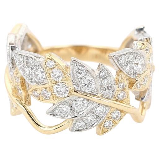 Tiffany & Co. Or jaune 18K et Platine Schlumberger Four Leaves Diamond Ring Band

De l'emblématique Tiffany & Co. Collection/One S, cette magnifique bague est un chef-d'œuvre d'artisanat et de design. Le motif des quatre feuilles, réalisé en or