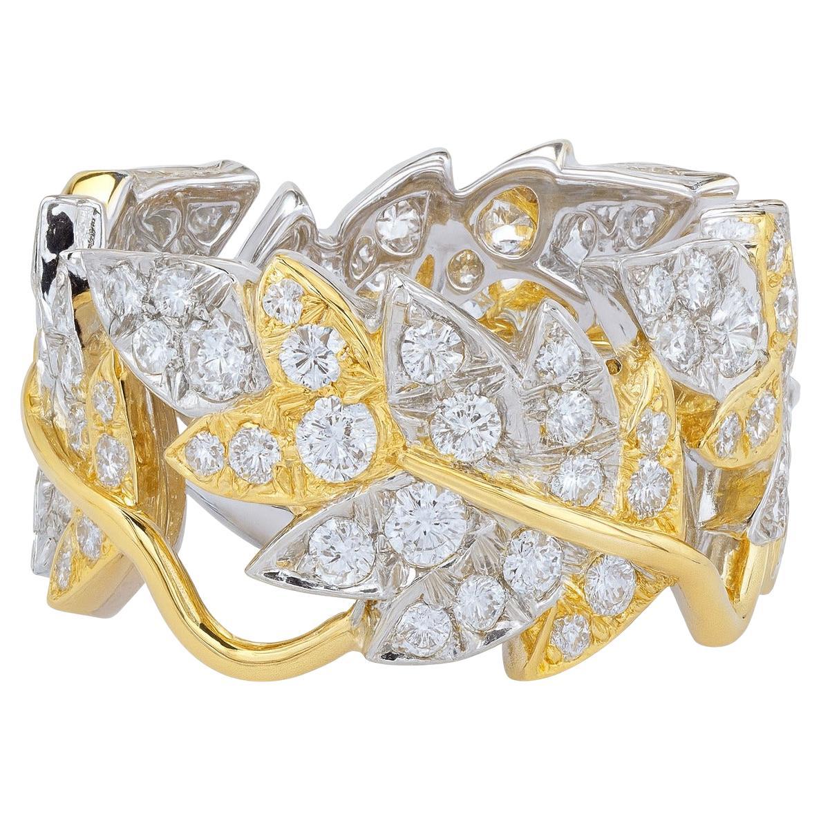 Tiffany
Co. Bague Schlumberger à quatre feuilles de diamant en or jaune 18K et platine