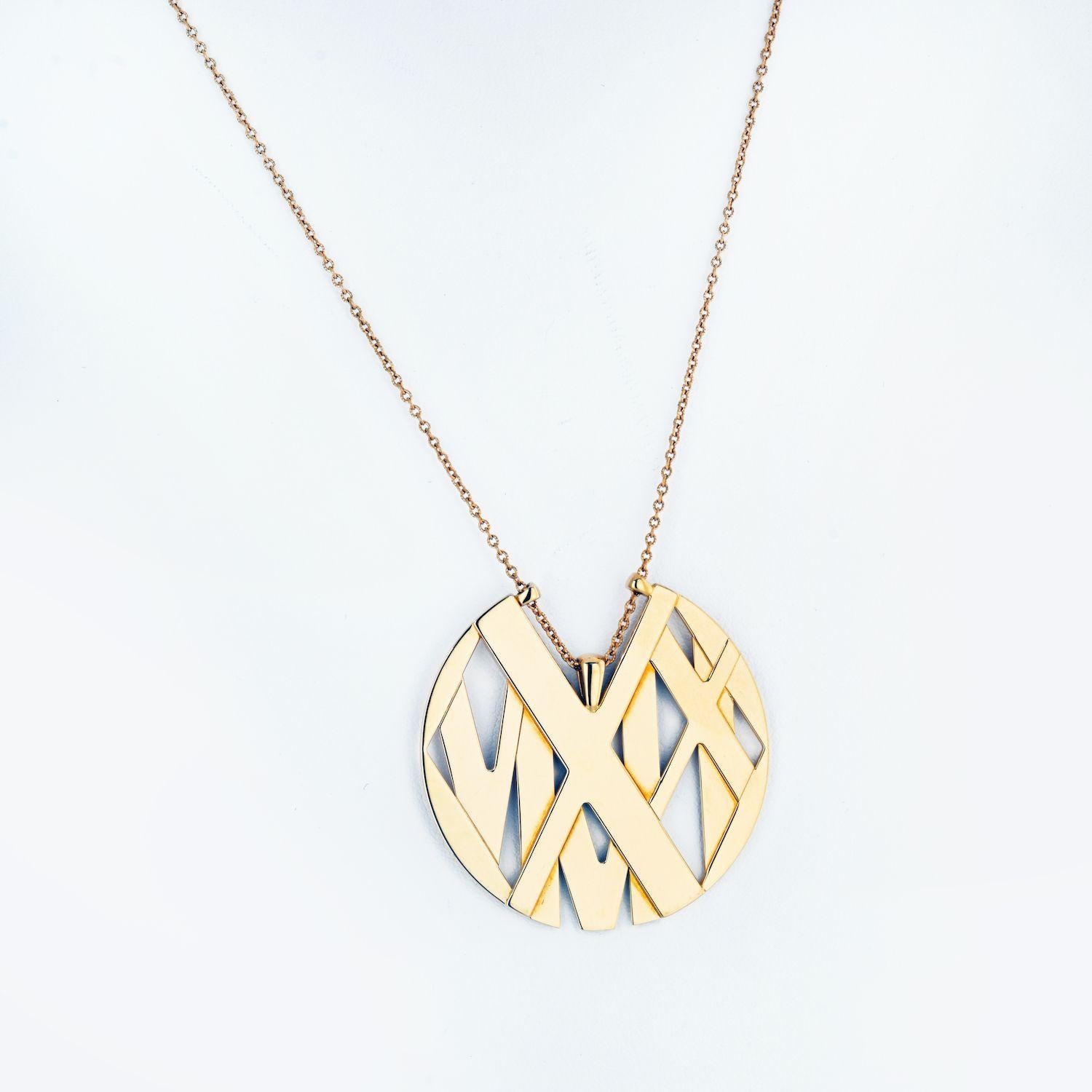 This is a beautiful authentic pendant and chain by Tiffany & Co. from the ATLAS collection. It is crafted from 18k yellow gold with a high polished finish. 

This is where strong lines meet striking numerals in a contemporary design that honours a