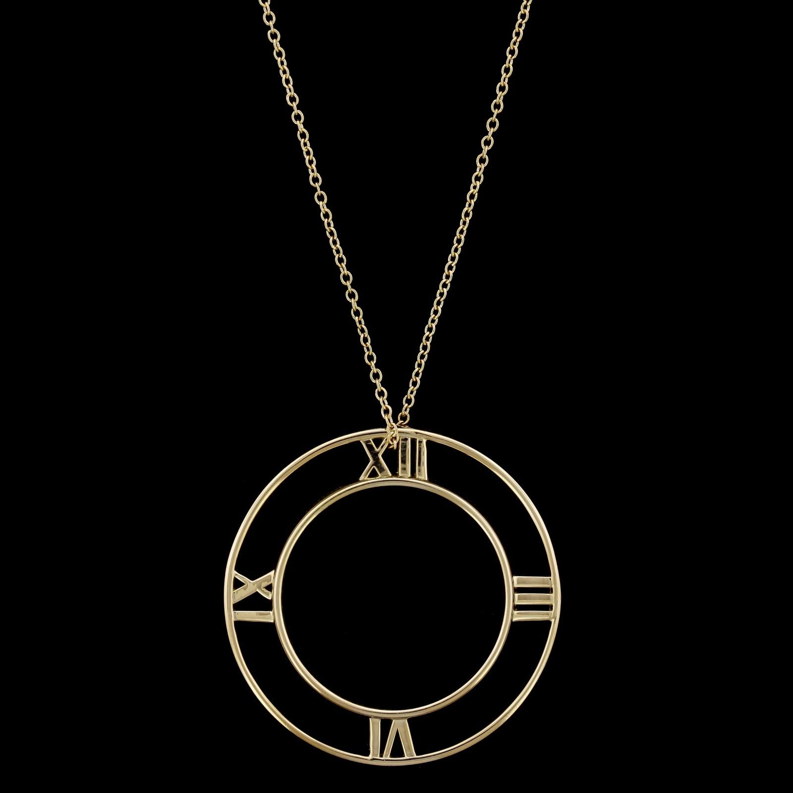 Tiffany & Co. 18K Yellow Gold Atlas Pendant Necklace. The pendant is suspended
from an 18