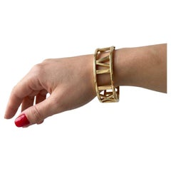 Tiffany & Co. 18K Yellow Gold Atlas Roman Numeral Wide Hinged Bangle Bracelet