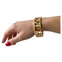 Tiffany & Co. 18K Yellow Gold Atlas Roman Numeral Wide Hinged Bangle Bracelet