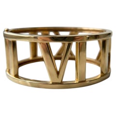 Tiffany & Co. 18K Yellow Gold Atlas Roman Numeral Wide Hinged Bangle Bracelet